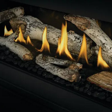 Linear gas fire place closeup of logs and fire